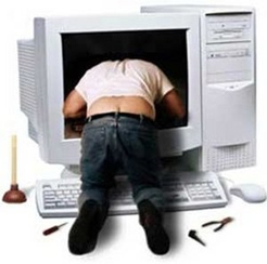 Image of man with head inside computer